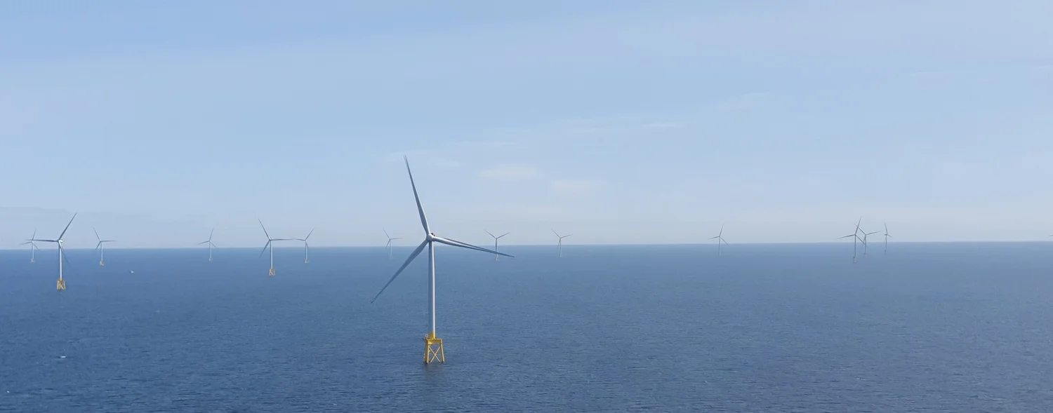 Offshore wind turbines extending across the sea